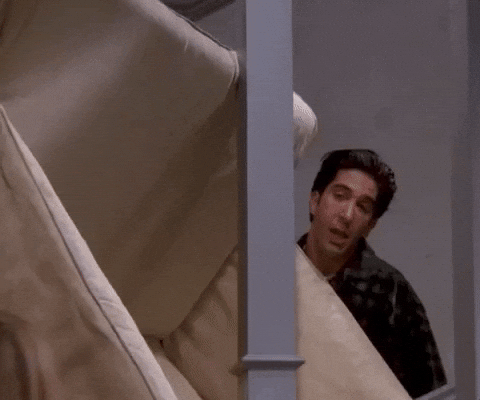 Humorous gif of the popular pivot scene in the show Friends